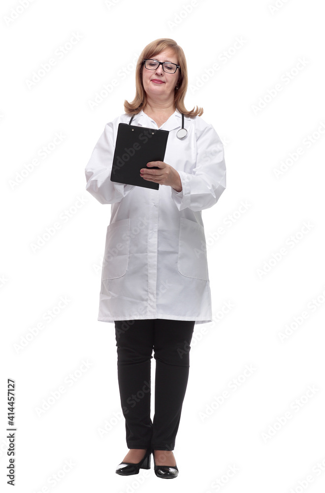 qualified female doctor making notes in the clipboard. qualified female doctor making notes in the clipboard.