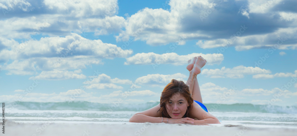 Happy lifestyle asian woman in sea beach, relax on the beach in summer. Travel Concept Happy lifestyle asian woman in sea beach, relax on the beach in summer. Travel Concept