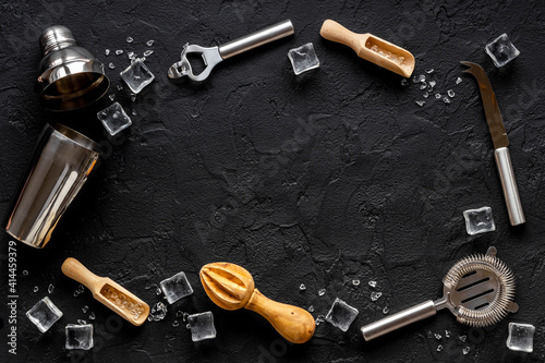 Barman equipment tools and cocktail ingredietns, top view photo