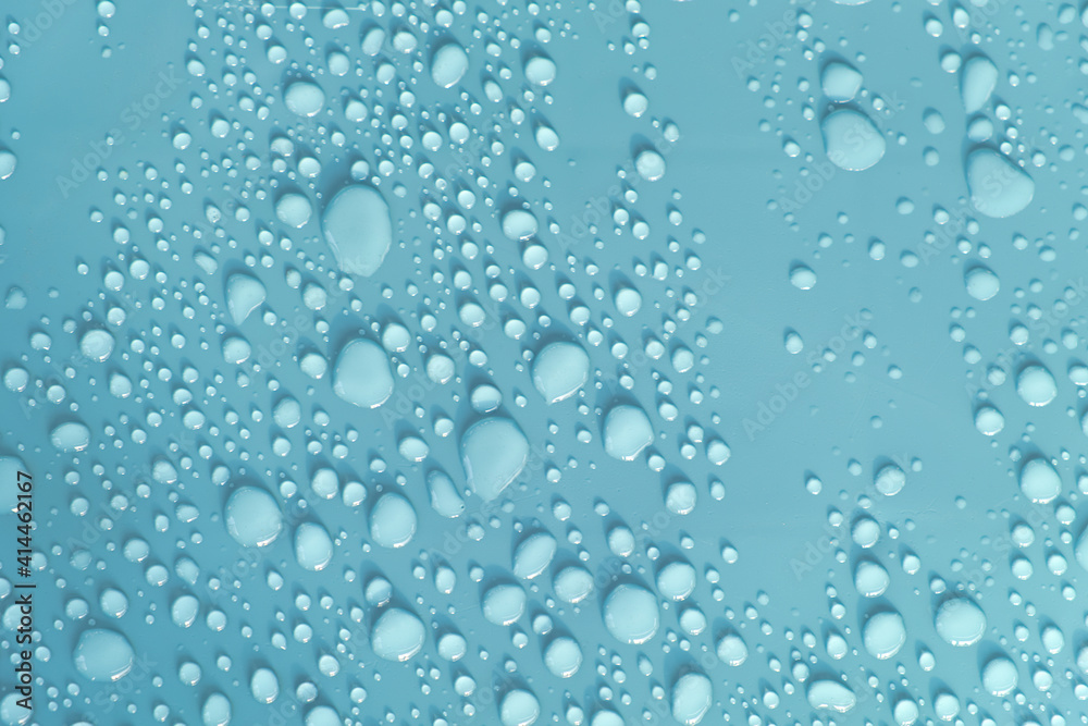 Many rainy drop on blue plastic sheet after rain stopped background
