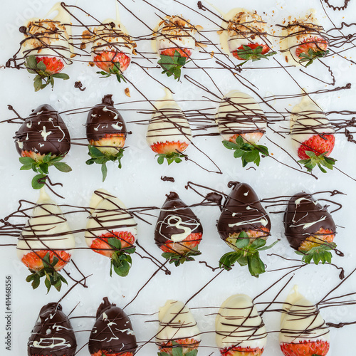 Closeup of chocolate strawberries homemade recipe, piped decoration