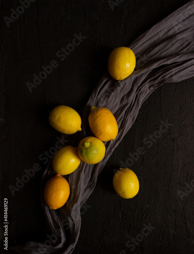 Lemons on dark background. Food photography. still life photography. Fresh fruit. Nature.