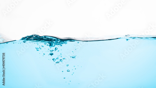 water wave with bubbles on white background. Water splash isolated on the white background.