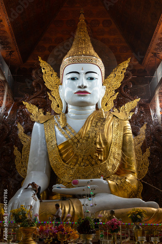Buddha in gold, royal clothes,Yangon, Myanmar,gold Buddha statue (Ngar Htat Gyi Pagoda) photo