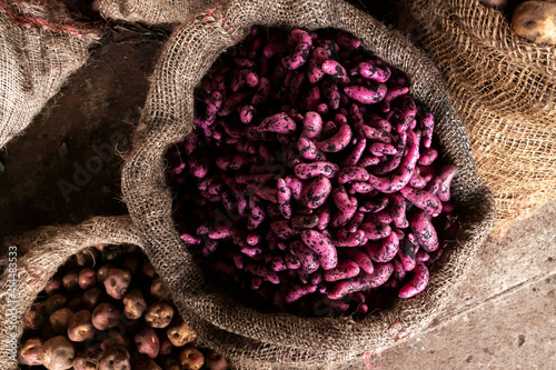 Tubers, potatoes, roots, etc, typical local products in the Silvia Market, in the Cauca Valley. Colombia. photo