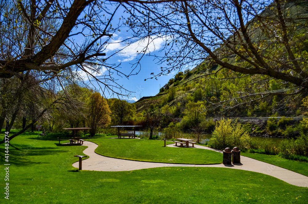 Table and benches in a recreation area near a small river in Utah, US Table and benches in a recreation area near a small river in Utah, US