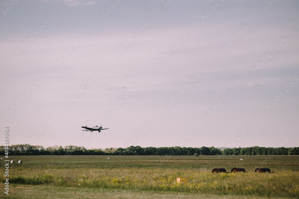 small plane flies in the sky, clouds, field small plane flies in the sky, clouds, field