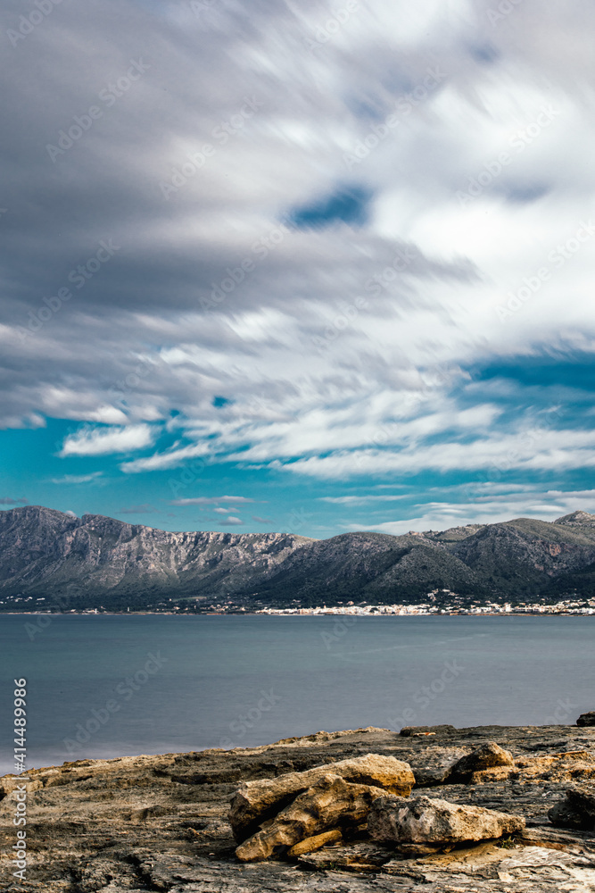 Mountains close to the sea with clouds moving Mountains close to the sea with clouds moving