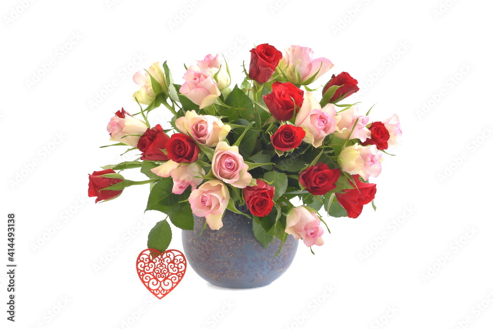 Obraz premium Bouquet of roses on white background. Red and pink roses in vase, and hesrt, for mothers day.