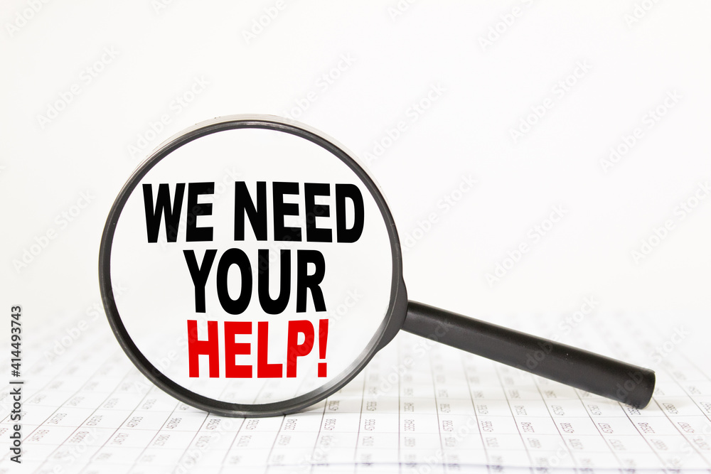 words WE NEED YOUR HELP in a magnifying glass on a white background. business concept words WE NEED YOUR HELP in a magnifying glass on a white background. business concept