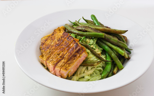 Steak with green beans and noodles