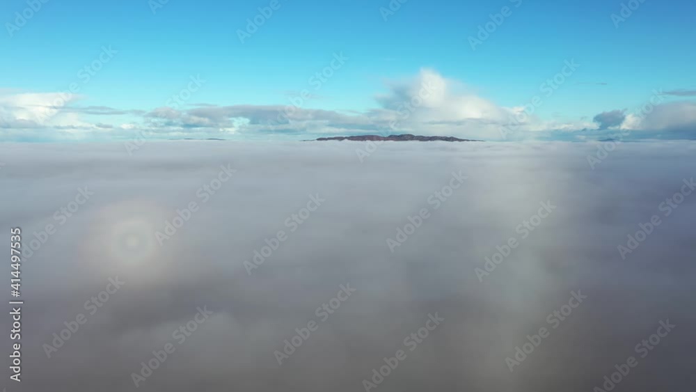Above the clouds at Portnoo in County Donegal with fog - Ireland Above the clouds at Portnoo in County Donegal with fog - Ireland