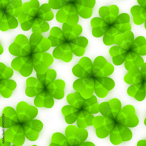 Pattern with green four-leaf lucky clovers