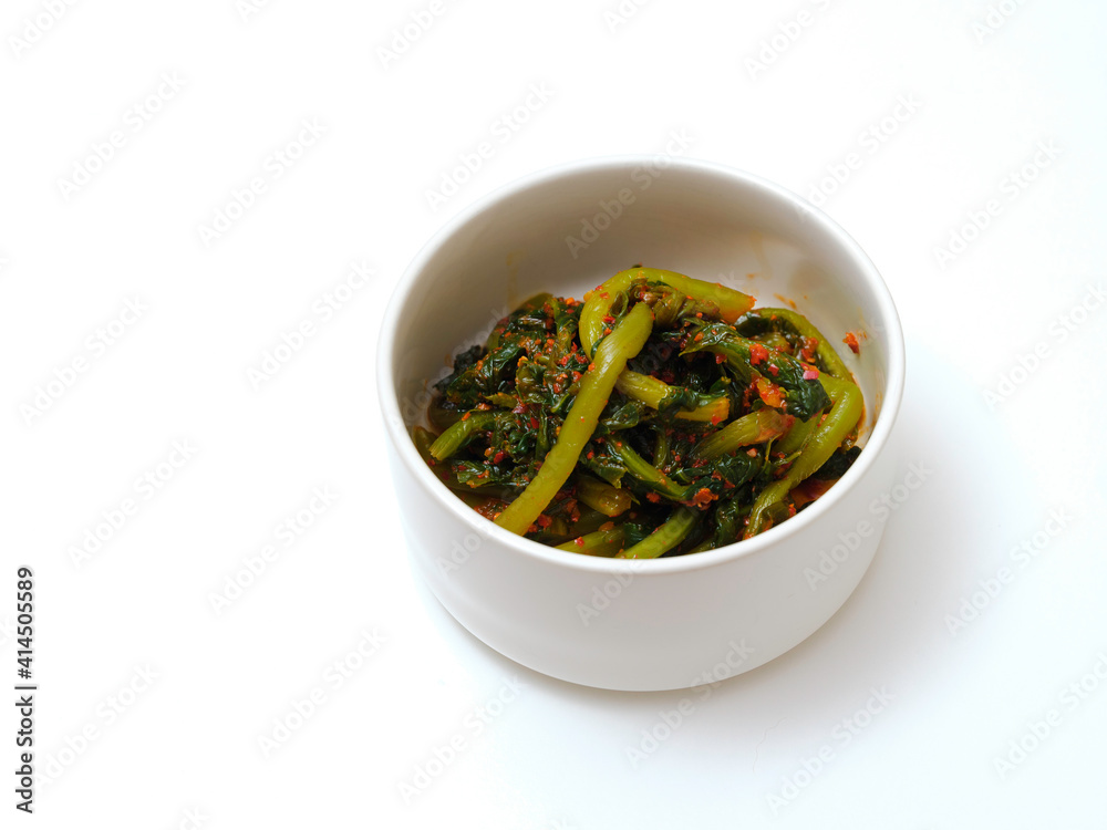 Korean Pickled Radish Stem Kimchee called Yeolmoo Kimchi served in a