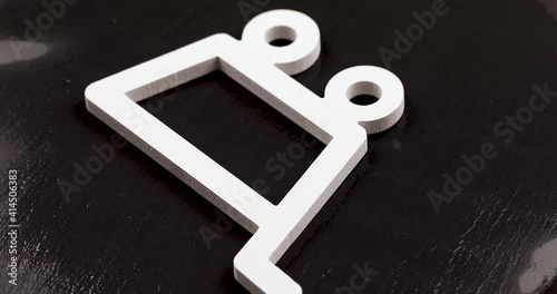 white plastic shopping cart icon rotating on black  background