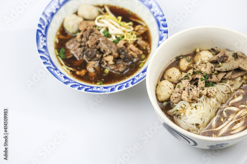 Thai boat noodles is Thailand's most famous noodles soup,Thai Boat noodles soup or Guay tiew reua ,Rice noodles thicken soup with stewed pork and pork ball, Braised pork and liver pork, 