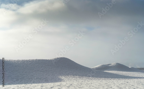 Snowy mountains and blue sky.