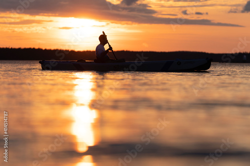 Kayaking in sunset  © Jarno