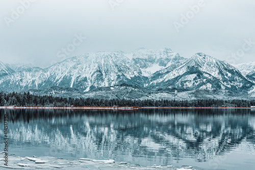 The Hopfensee with the Allgäu Alps in winter. Germany.