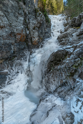 Ice waterfall Riesachfalle in cold frosty day in Austria
