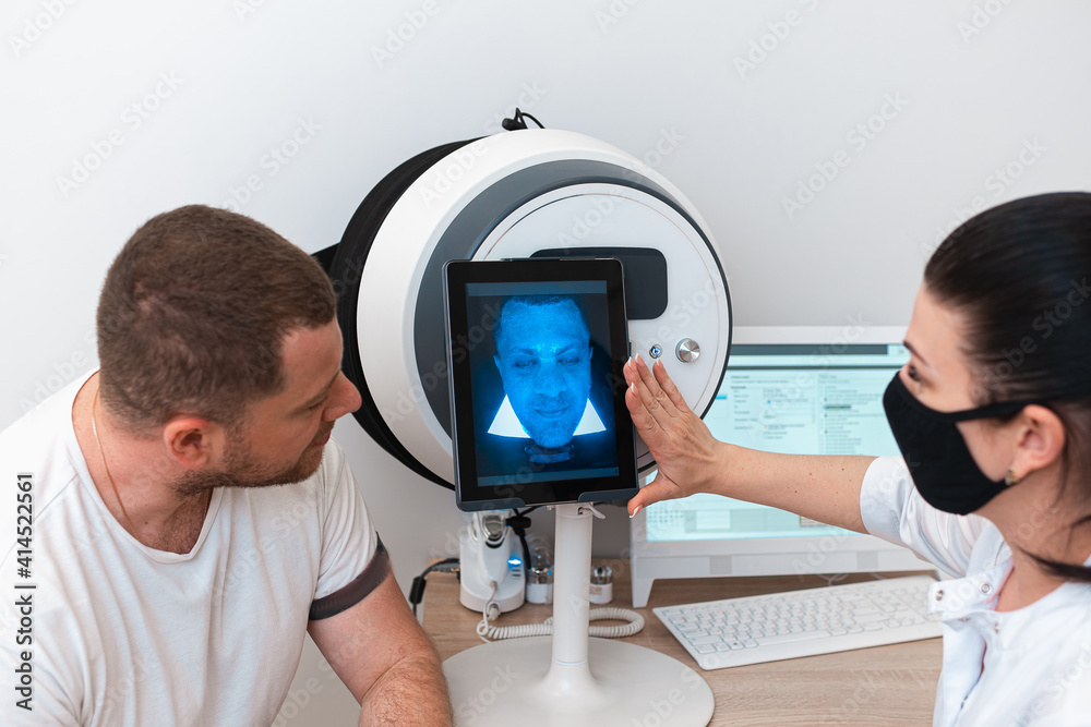 Investigation of the condition of the facial skin using a wood lamp on modern cosmetic equipment