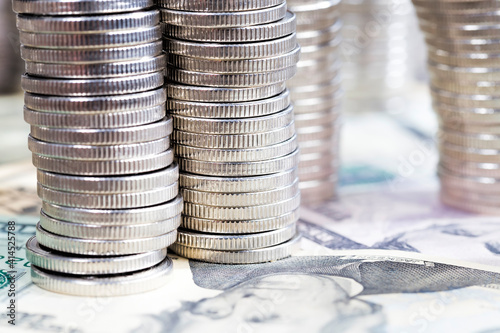 a large number of silver-colored metal coins photo