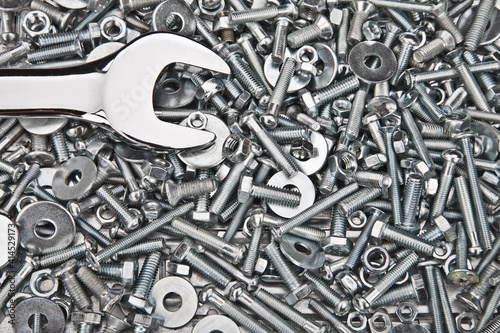 Chrome spanner, nuts and bolts useful as a background