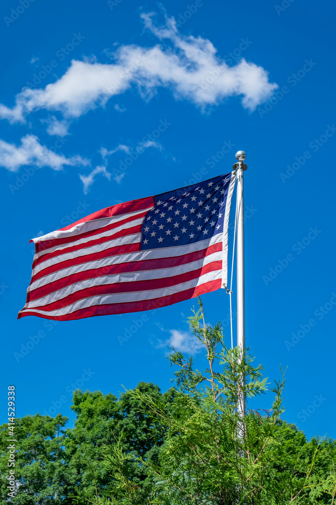 Fototapeta premium American flag blowing in the wind, USA
