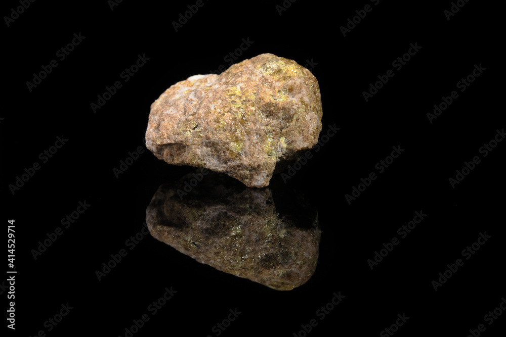 Sulfur in rock from Gaurdak, Turkmenistan on black glass background. Sulfur Mineral. Sulfur in rock from Gaurdak, Turkmenistan on black glass background. Sulfur Mineral.