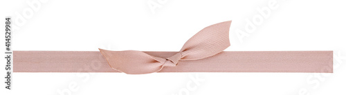 Textile ribbon and bow isolated on a white background to decorate gift boxes. Design element with clipping path