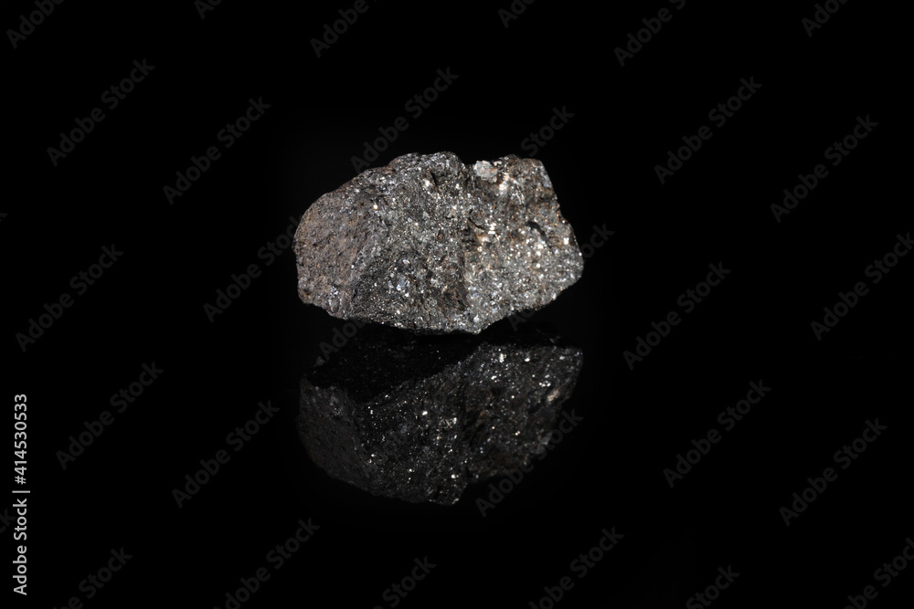 Mineral sphalerite, zinc blende from Zyrianovskoe, Altai, Russia on black glass background. Mineral sphalerite, zinc blende from Zyrianovskoe, Altai, Russia on black glass background.