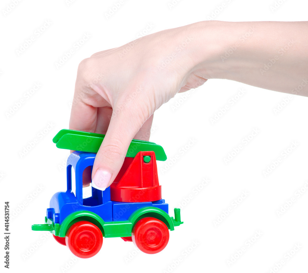 plastic toy car with a ladder in hand on white background isolation