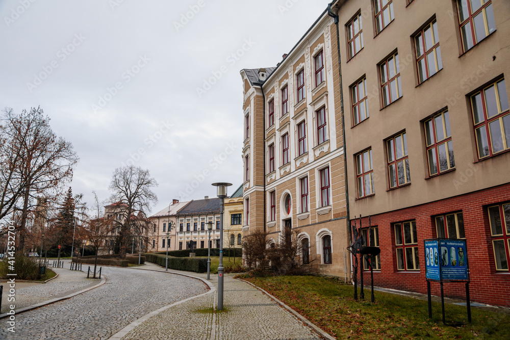 Historical building of Secondary School of Applied Arts and Higher Vocational School, cityscape of medieval town in winter day, Bohemian Paradise, Turnov, Czech Republic