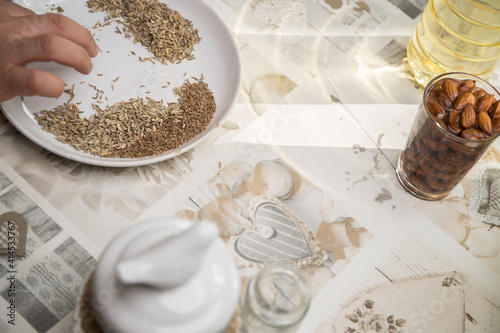a hand sieving and cleaning seeds, remove impurity of anise and fennel seeds