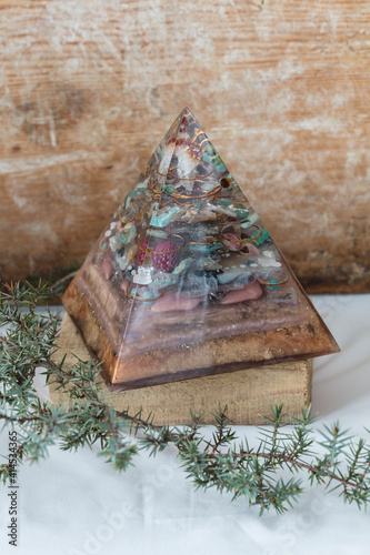 Orgonite with crystal stones and copper wire inside. photo