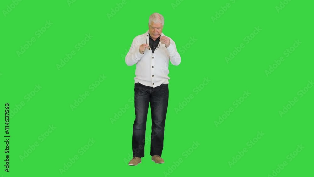 Really tired grey haired senior business man taking off glasses on a Green Screen, Chroma Key. Really tired grey haired senior business man taking off glasses on a Green Screen, Chroma Key.