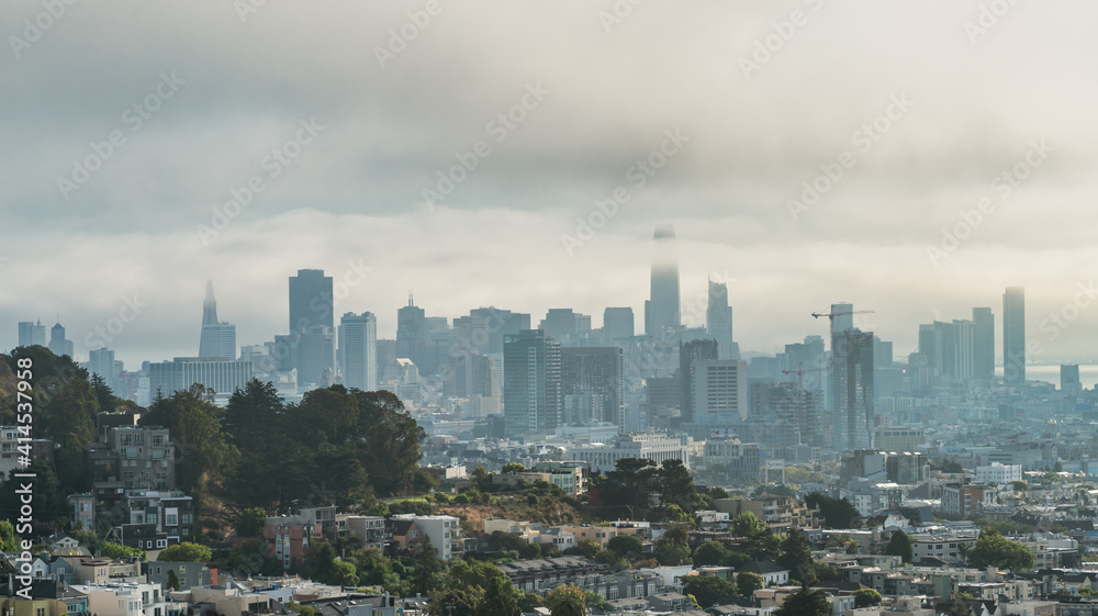 Fototapeta premium San Francisco, California, USA - August 2019: San Francisco downtown cityscape on a hazy day