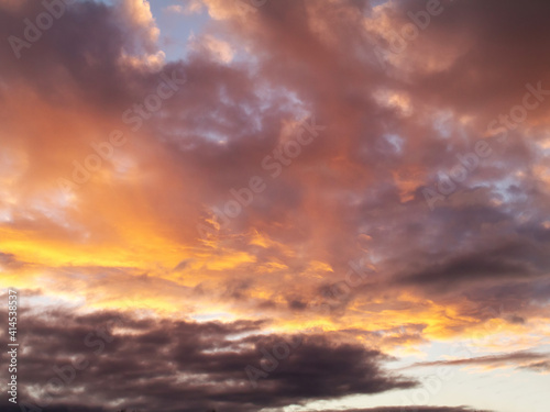 Beautiful dramatic sunset sky. Rich orange color. Nature background © mark_gusev