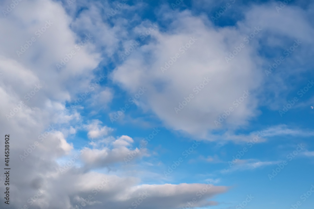 Beautiful cloudy sky scene. Clean blue sky with fluffy clouds. Nature background.