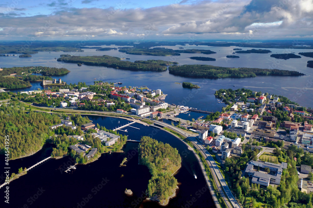 Finlandia, Savonlinna, aerial view of the city of Savonlinna with castle on the left