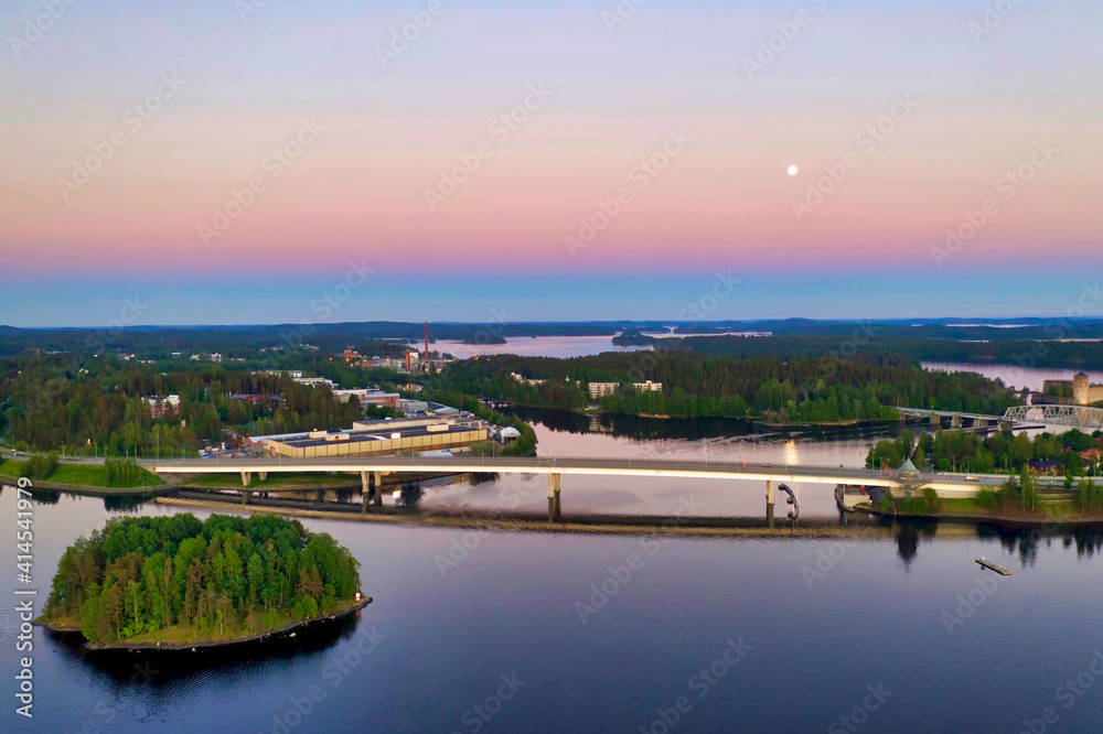 Finlandia, Savonlinna, sunset reflected on the lake, moon rising