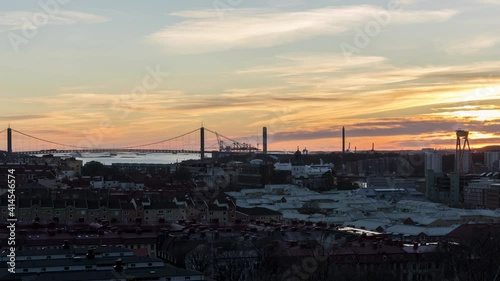 Sunset over the city Gothenburg, Sweden. Panning shot, Timelapse. 4K. 25p photo