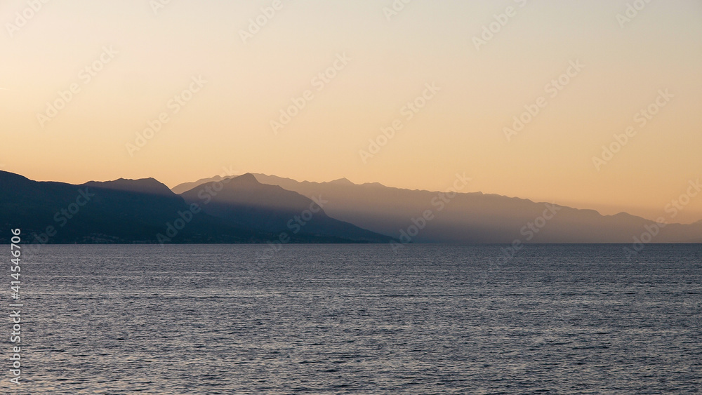 Sunrise over the mountains and sea in Croatia