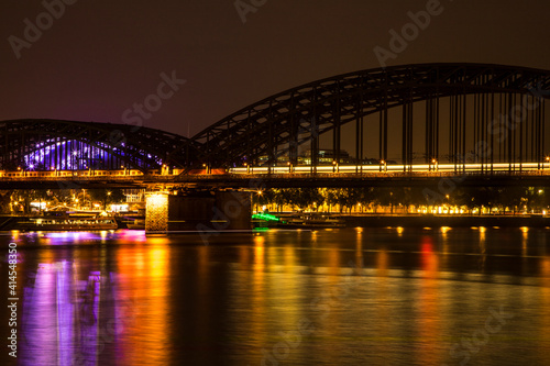 Germany, North Rhine-Westphalia, Cologne. Bridge over the Rhine River at night.