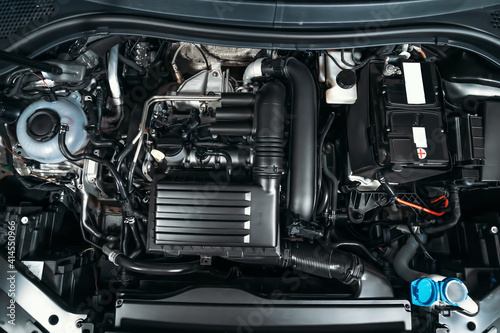 Obraz na płótnie View under car hood at modern turbocharged eco-friendly engine or motor close up