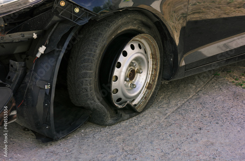 Accident on the road with damage to the car. knocked wheel.