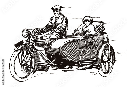 Smiling woman and man from early 20th century riding antique motorcycle with sidecar, in three-quarter view