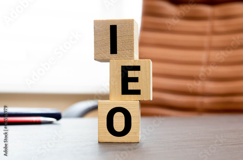 word IEO on wooden block photo