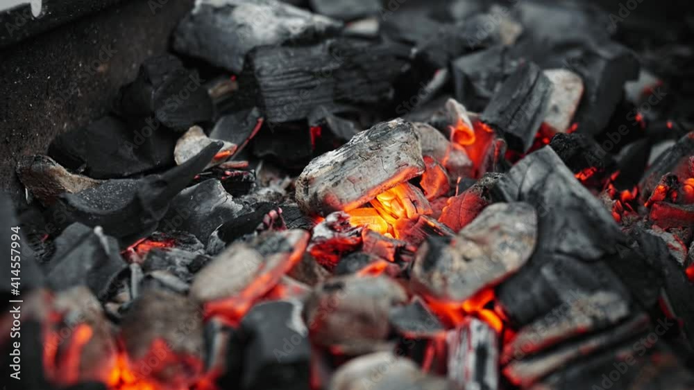 Burning coal in iron brazier. Preparation for barbecue. Burning coal in iron brazier. Preparation for barbecue.