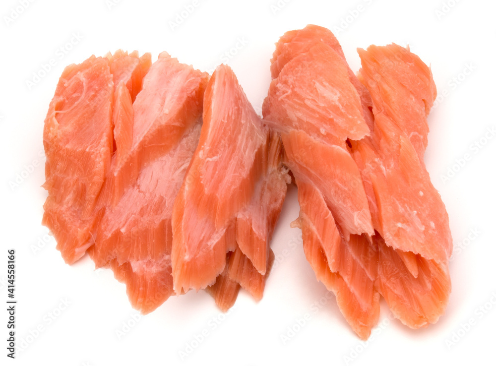 smoked salmon segments isolated on white background cutout. Prepared fish fillet fibres. smoked salmon segments isolated on white background cutout. Prepared fish fillet fibres.